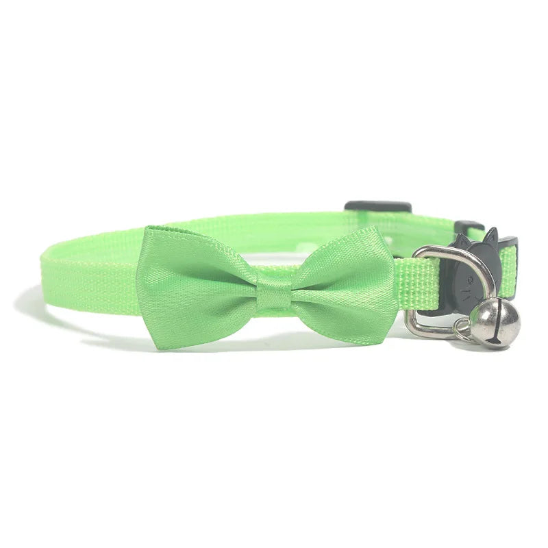 Adjustable cat collar with bow and bell