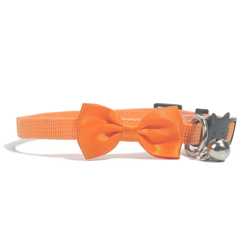 Adjustable cat collar with bow and bell