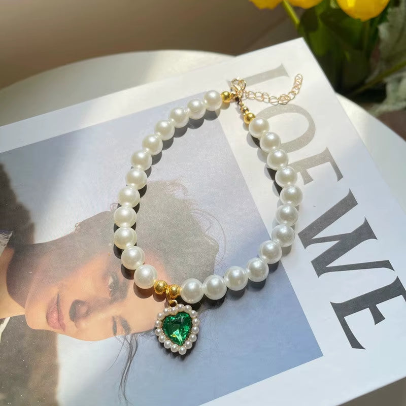 Pearl pet necklace with green heart pendant