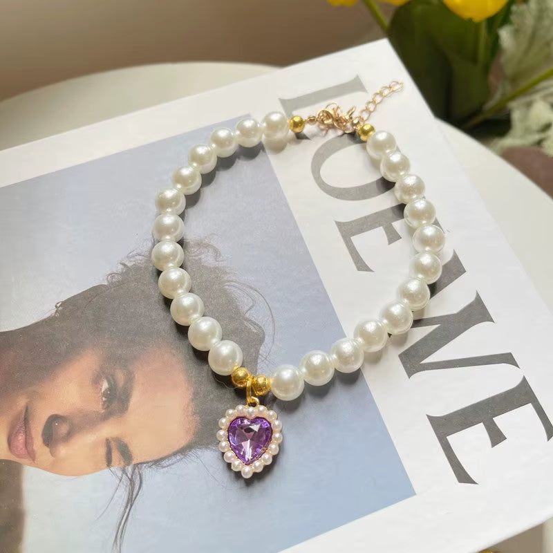 Pearl pet necklace with purple heart pendant