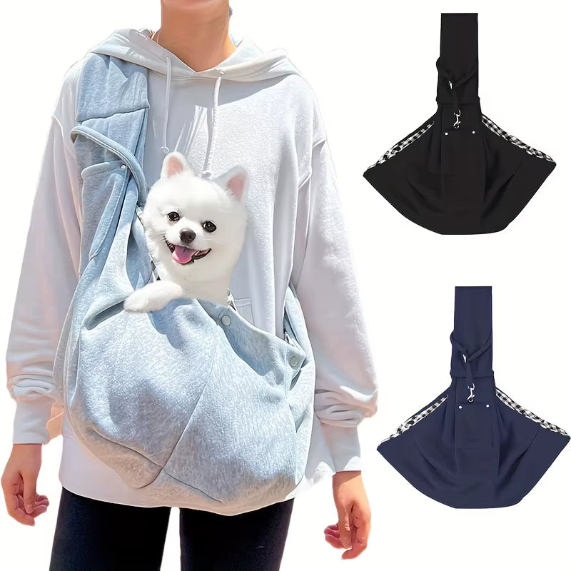Soft-sided pet carrier with an adjustable crossbody shoulder strap.
