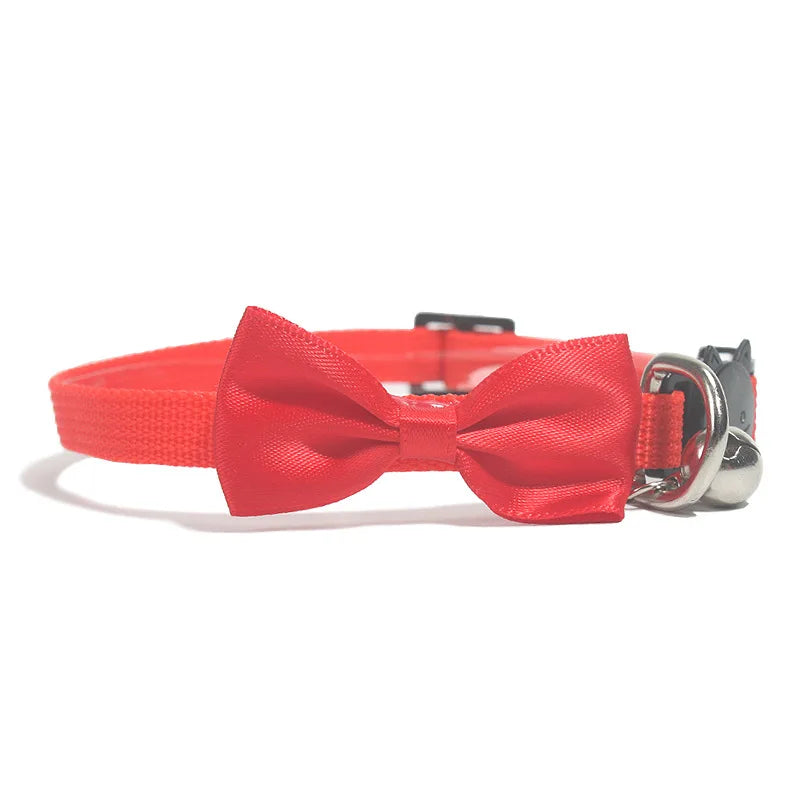 Adjustable cat collar with bow and bell