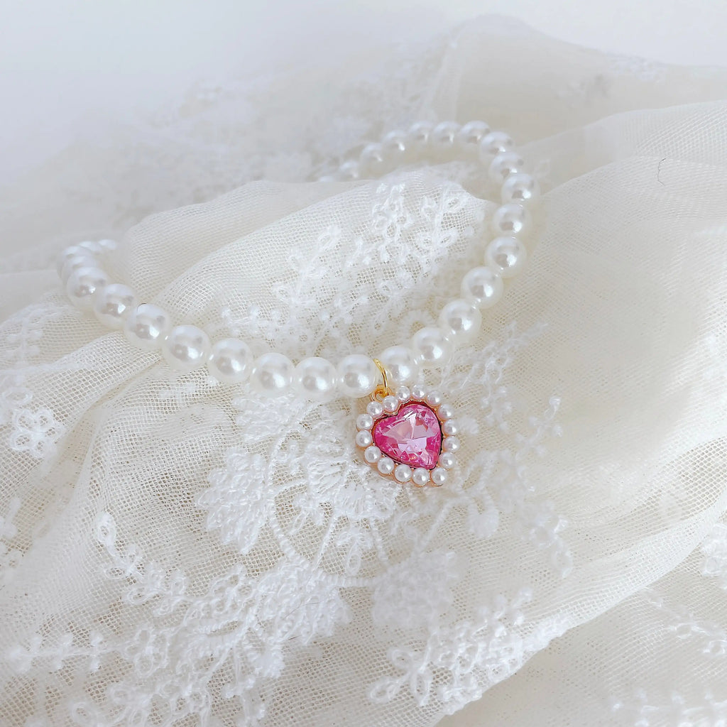 Pearl pet necklace with pink heart pendant