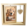 Rotating pet memorial photo frame with heart pendant.