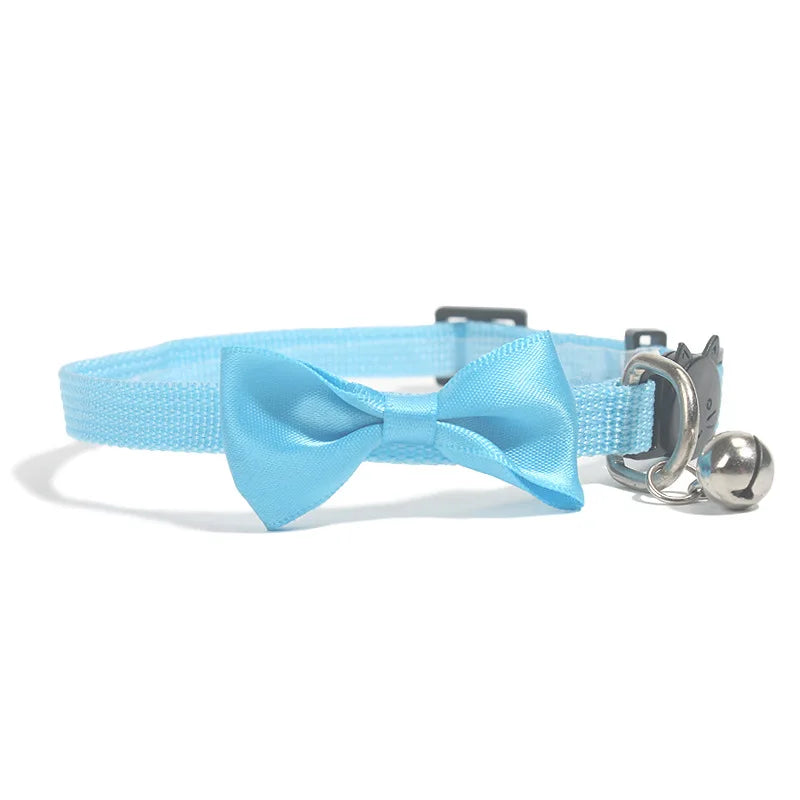 Adjustable cat collar with bow and bell