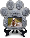 Paw-shaped pet memorial stone with engraved remembrance message.