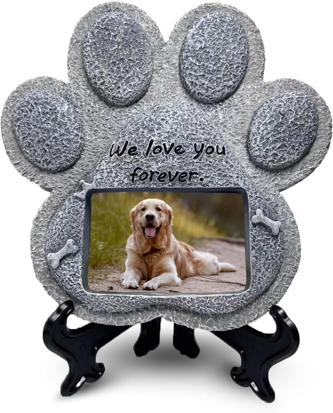 Paw-shaped pet memorial stone with engraved remembrance message.